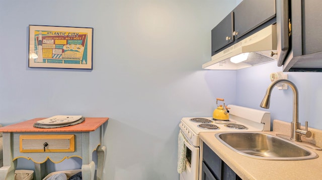 108 S Montpelier Ave Unit 211, Atlantic City, NJ 08401 - kitchen with under cabinet range hood, light countertops, and white range with electric cooktop