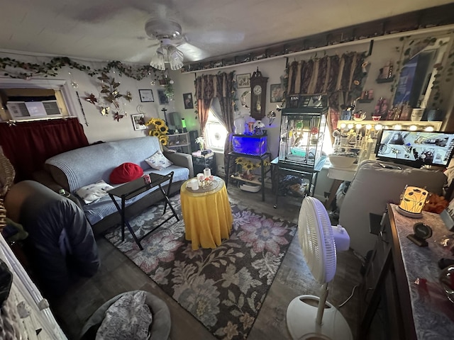 miscellaneous room featuring wood-type flooring, ceiling fan, and ornamental molding