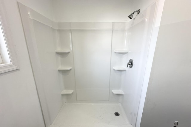 bathroom featuring a shower