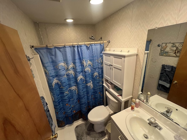 bathroom with a shower with shower curtain, toilet, vanity, tile patterned flooring, and recessed lighting