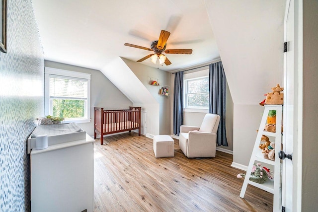 1731 Rte 47, Eldora, NJ 08270 - bedroom with light wood finished floors, multiple windows, a crib, and vaulted ceiling