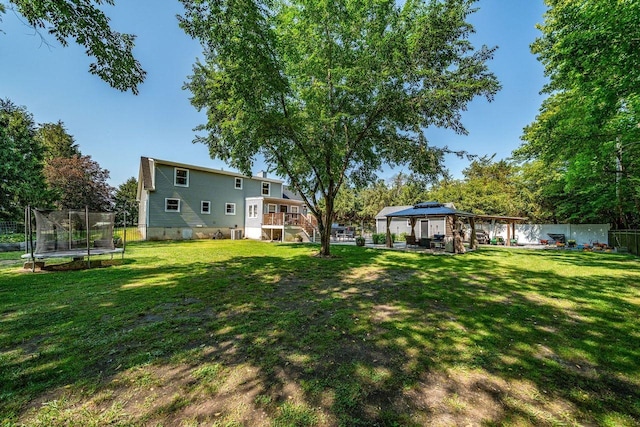 1731 Rte 47, Eldora, NJ 08270 - fenced backyard with a gazebo, a trampoline, and stairs