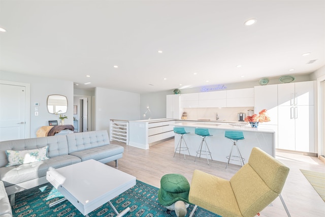 living room with light hardwood / wood-style floors