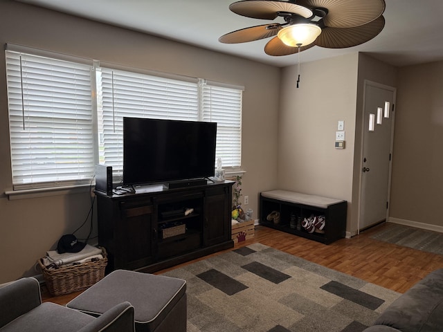 1964 E Oak Rd, Vineland, NJ 08360 - living area with wood finished floors, ceiling fan, and baseboards