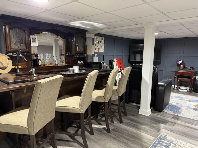 1964 E Oak Rd, Vineland, NJ 08360 - indoor dry bar with a decorative wall, a paneled ceiling, and light wood-type flooring