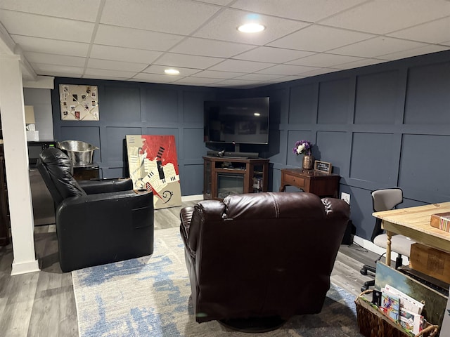 1964 E Oak Rd, Vineland, NJ 08360 - living area featuring a decorative wall, a paneled ceiling, wood finished floors, and recessed lighting