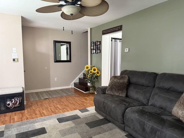 1964 E Oak Rd, Vineland, NJ 08360 - living room with ceiling fan, wood finished floors, stairs, and baseboards
