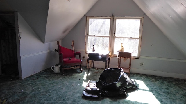 bonus room featuring carpet flooring and vaulted ceiling