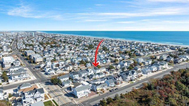 243 110th St, Stone Harbor, NJ 08247 - aerial overview of property's location with a large body of water and nearby suburban area