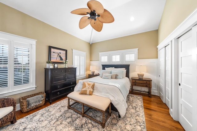 243 110th St, Stone Harbor, NJ 08247 - bedroom featuring wood finished floors, multiple closets, ceiling fan, and lofted ceiling