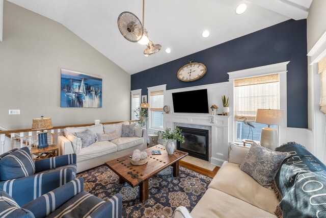 243 110th St, Stone Harbor, NJ 08247 - living room featuring lofted ceiling, a premium fireplace, wood finished floors, and recessed lighting