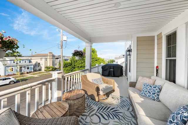243 110th St, Stone Harbor, NJ 08247 - balcony featuring a grill and a residential view