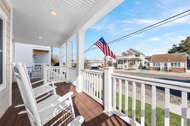 deck with covered porch