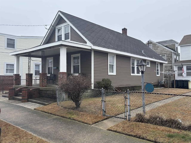 view of front of home featuring covered porch