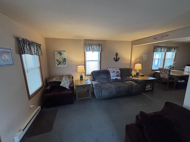 carpeted living room featuring plenty of natural light and baseboard heating