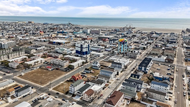 drone / aerial view with a water view and a city view