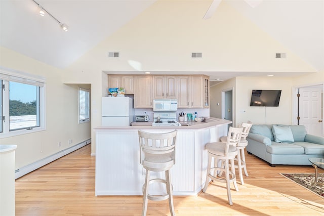 kitchen with white appliances, light hardwood / wood-style flooring, high vaulted ceiling, and baseboard heating