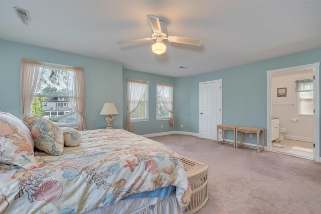 119 Stevens St, West Cape May, NJ 08204 - bedroom featuring multiple windows, carpet floors, ensuite bathroom, and a ceiling fan