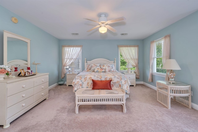 119 Stevens St, West Cape May, NJ 08204 - carpeted bedroom featuring multiple windows and ceiling fan