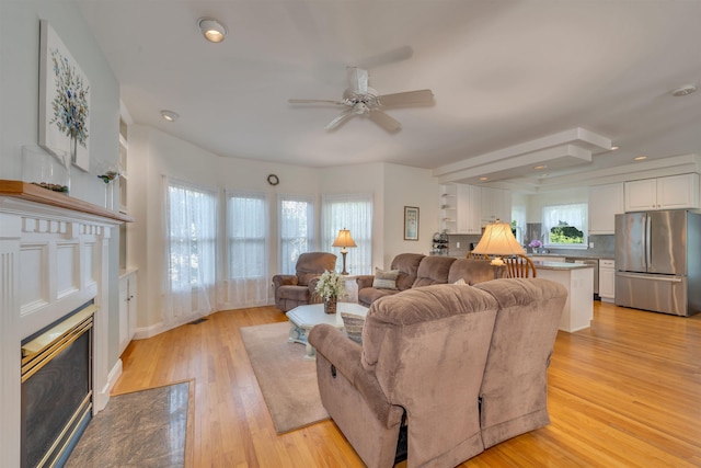 119 Stevens St, West Cape May, NJ 08204 - living area with a ceiling fan, a fireplace with flush hearth, light wood-type flooring, and recessed lighting