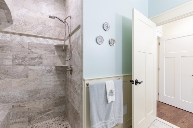310 Brainard Ave, Cape May Point, NJ 08212 - full bathroom featuring a tile shower and wood finished floors