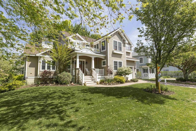 310 Brainard Ave, Cape May Point, NJ 08212 - view of front facade with a porch and a front lawn