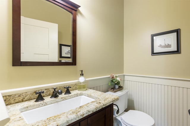 310 Brainard Ave, Cape May Point, NJ 08212 - bathroom with a wainscoted wall, vanity, and toilet