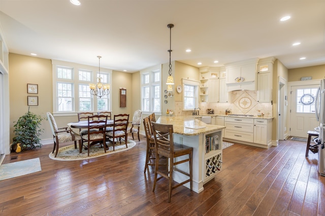310 Brainard Ave, Cape May Point, NJ 08212 - dining room with dark wood-type flooring, baseboards, a chandelier, and recessed lighting