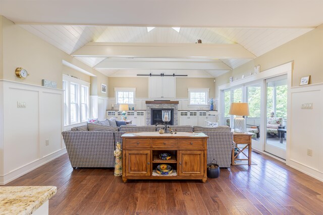 310 Brainard Ave, Cape May Point, NJ 08212 - living room featuring dark wood-style floors and a wainscoted wall