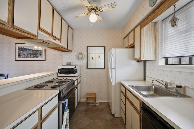 14 Genoa Ct Unit 14, Ocean City, NJ 08226 - kitchen featuring wallpapered walls, light countertops, white appliances, and a sink