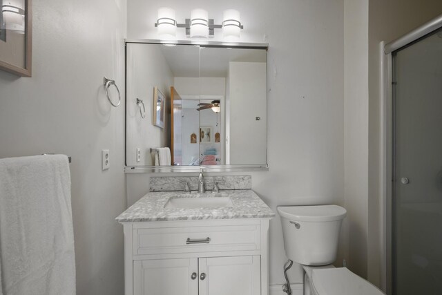 14 Genoa Ct Unit 14, Ocean City, NJ 08226 - bathroom with ceiling fan, toilet, vanity, and a shower with door