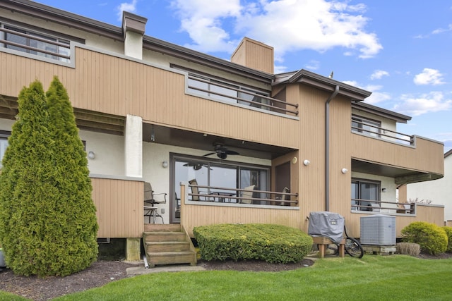 14 Genoa Ct Unit 14, Ocean City, NJ 08226 - back of house with central air condition unit, a yard, a ceiling fan, and a balcony