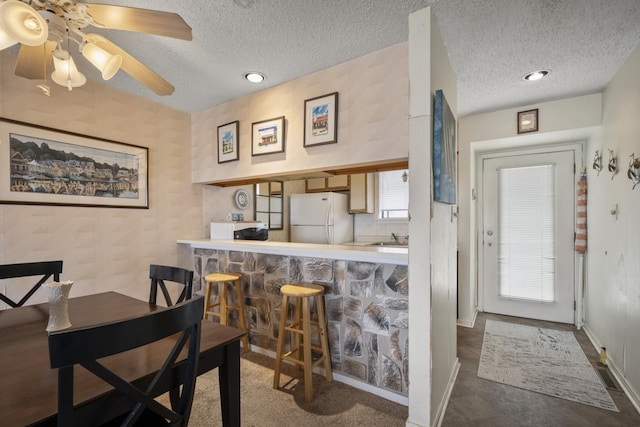 14 Genoa Ct Unit 14, Ocean City, NJ 08226 - dining space with recessed lighting, a textured ceiling, baseboards, and ceiling fan