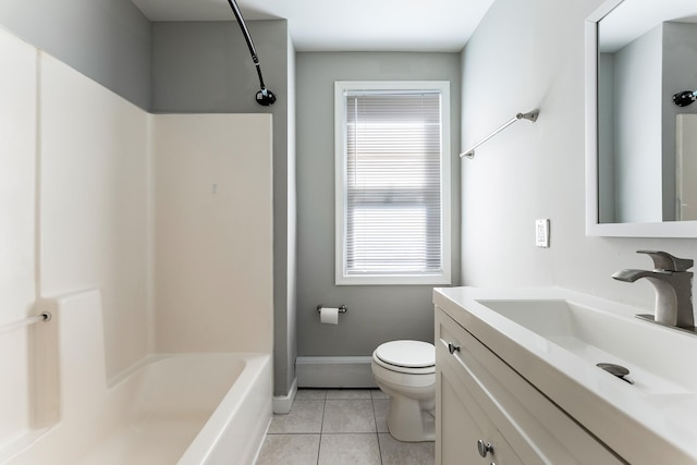 full bathroom with tile patterned floors, plenty of natural light, toilet, and vanity