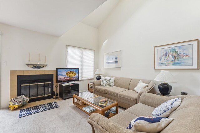 111 Austin Ave Unit 111, Lower Township, NJ 08260 - living area with light colored carpet, a tile fireplace, and high vaulted ceiling
