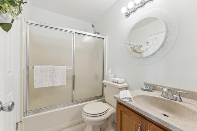 111 Austin Ave Unit 111, Lower Township, NJ 08260 - bathroom featuring vanity, bath / shower combo with glass door, and toilet
