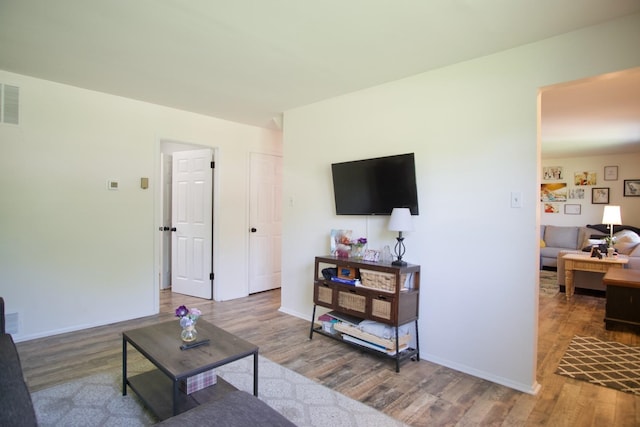 living room with hardwood / wood-style floors