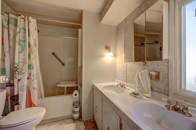 full bathroom featuring shower / bath combination with curtain, toilet, double vanity, and a sink