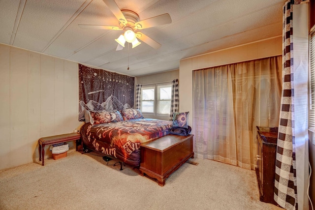 carpeted bedroom featuring a ceiling fan