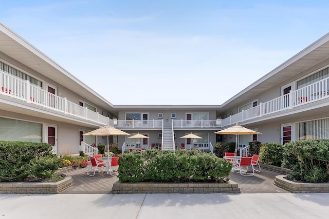 view of community with a patio area