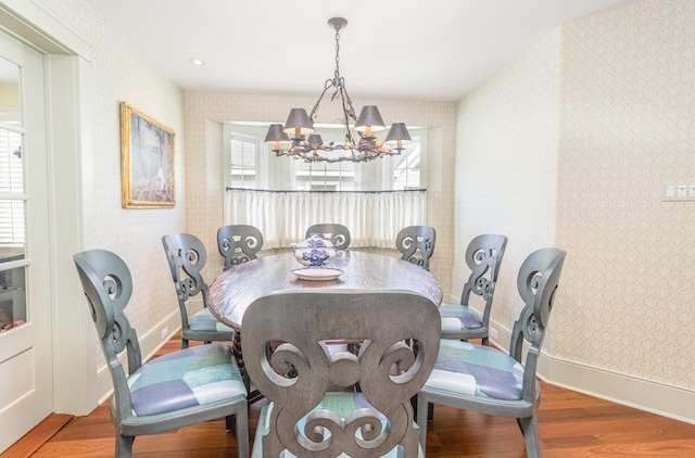 74 W 7th St, Avalon, NJ 08202 - dining room with wallpapered walls, wood finished floors, and a chandelier