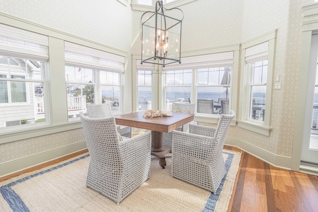 74 W 7th St, Avalon, NJ 08202 - sunroom featuring a chandelier and plenty of natural light