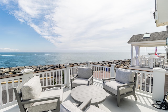 74 W 7th St, Avalon, NJ 08202 - wooden deck featuring a water view