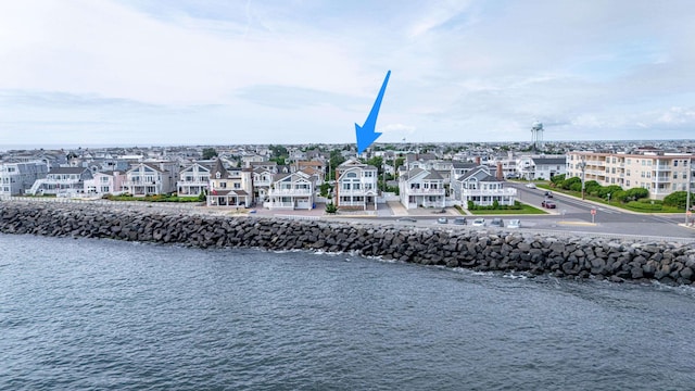 74 W 7th St, Avalon, NJ 08202 - aerial view of residential area featuring a large body of water
