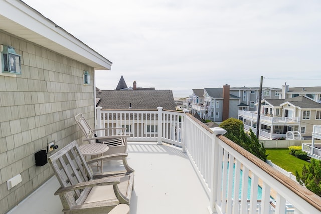 74 W 7th St, Avalon, NJ 08202 - balcony featuring a residential view