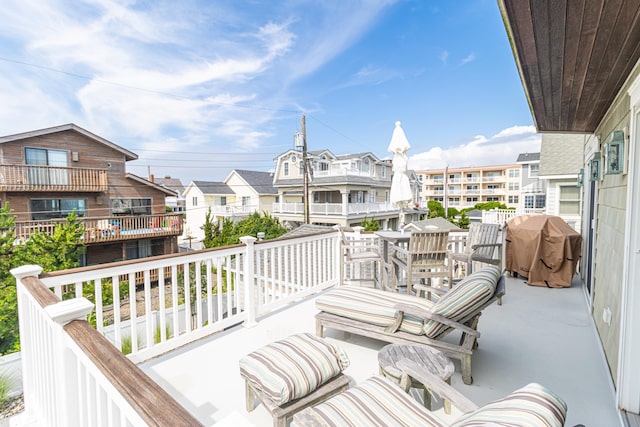 74 W 7th St, Avalon, NJ 08202 - balcony featuring a grill and a residential view