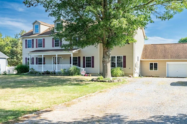 15 4th Ave, Cape May Court House, NJ 08210 - colonial house featuring covered porch, a garage, gravel driveway, and a front lawn