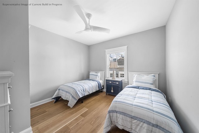 288 86th St, Stone Harbor, NJ 08247 - bedroom with light wood finished floors and a ceiling fan
