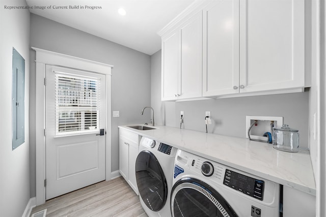 288 86th St, Stone Harbor, NJ 08247 - washroom with washer and clothes dryer, cabinet space, and light wood finished floors