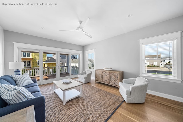 288 86th St, Stone Harbor, NJ 08247 - living room featuring healthy amount of natural light, wood finished floors, and ceiling fan